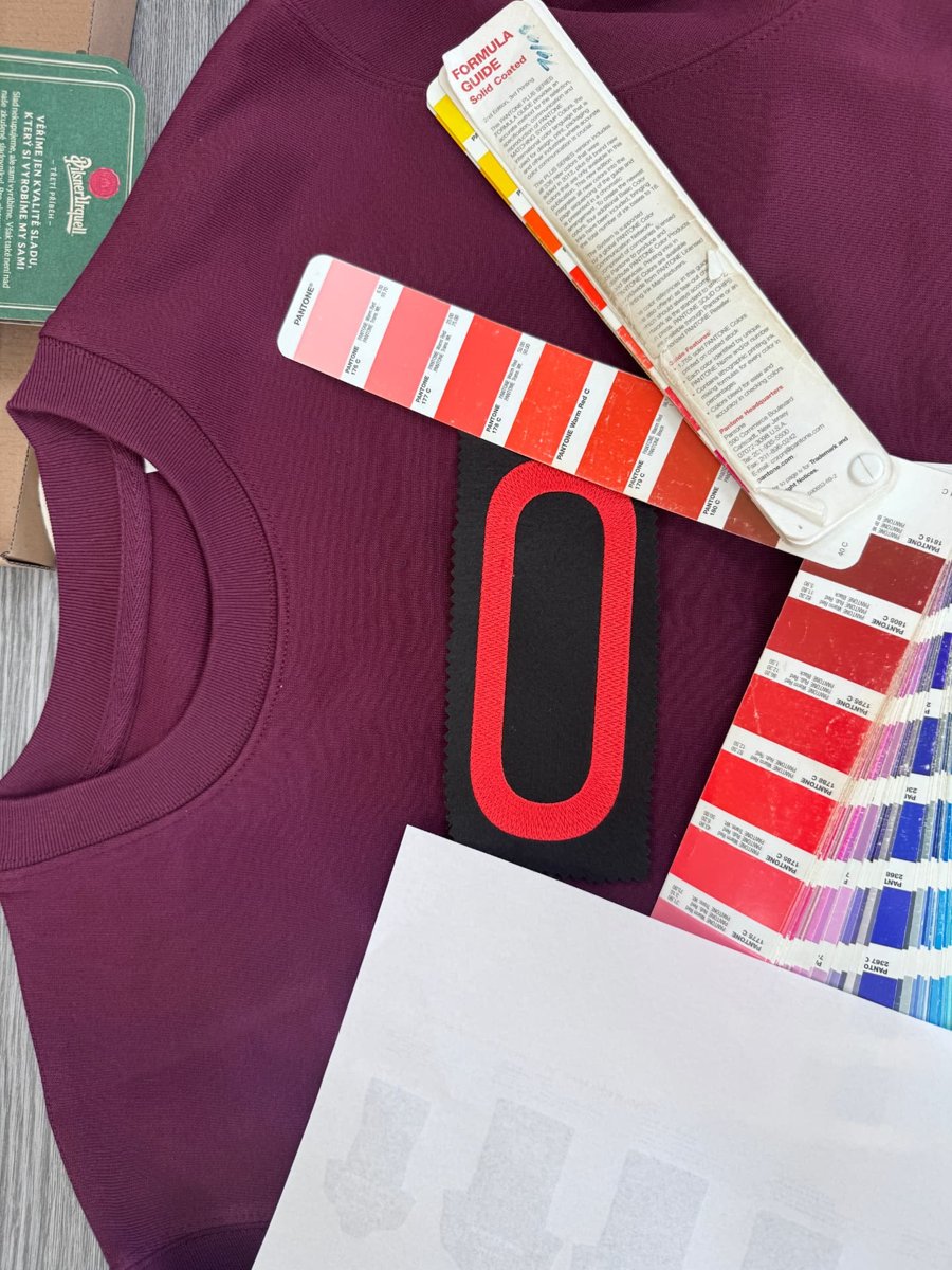 Burgundy Frontkon#26 crewneck with red and black woven patch and Pantone swatches